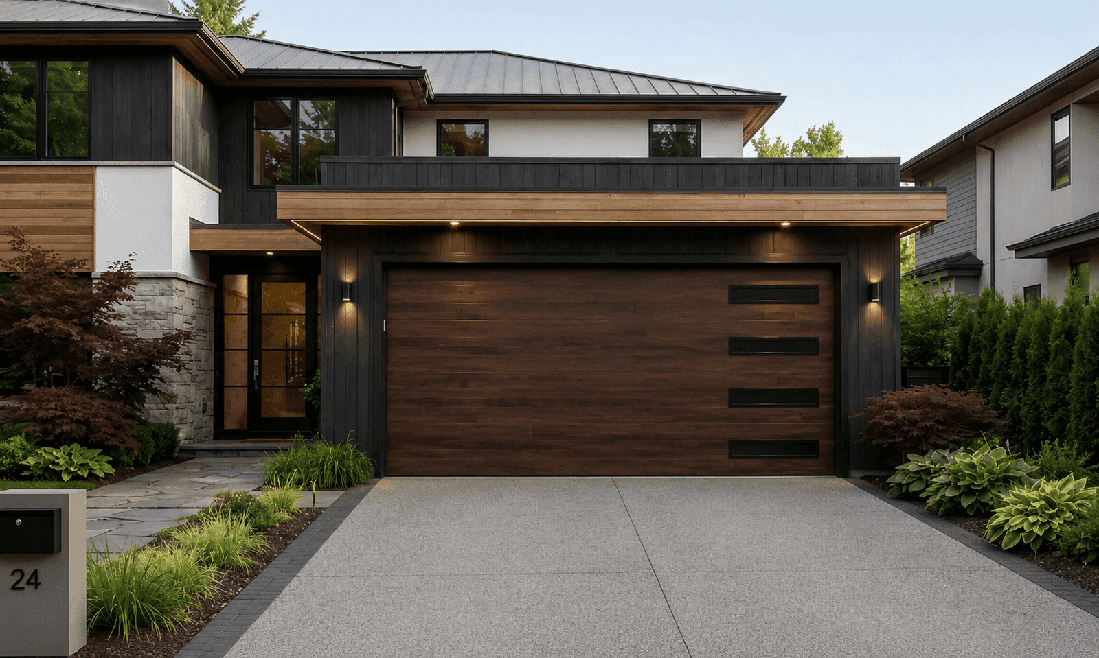A modern home with a new dark wood-look garage door